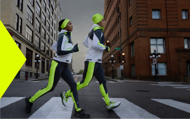 Two runners on a run at night