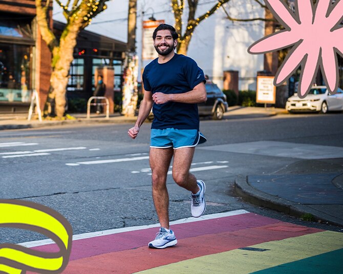 Mikah Meyers, running with illustrations of rainbows in the corner