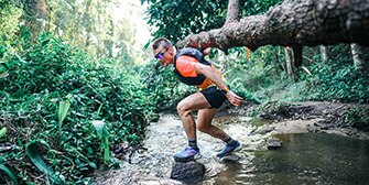 Action shot of Luke during one of his trail running races