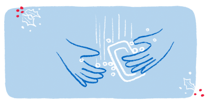 An illustration of a pair of hands lathering up with a bar of soap. 