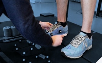 Running shoes being tied