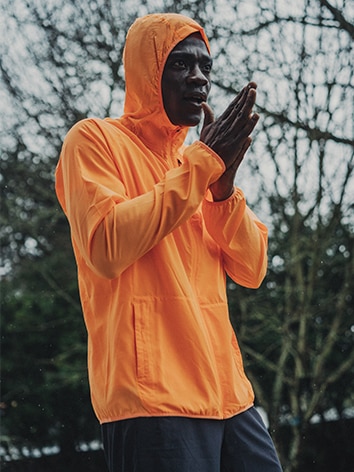 Runner rubbing his hands together