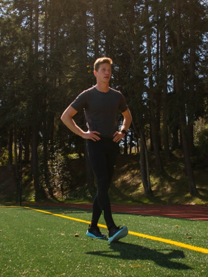 Brannon Kidder walking on a turf field