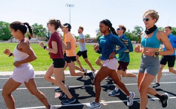 Runners running on a track