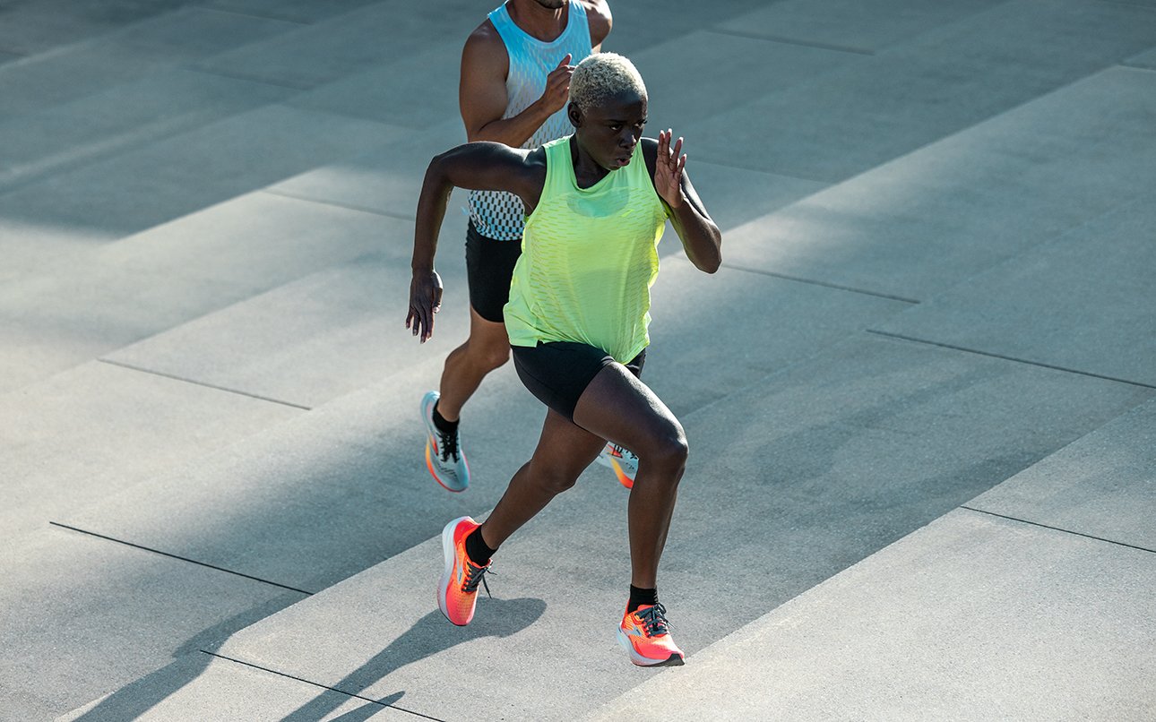 Two Runnears wearing the Hyperion Max and Hyperion Elite