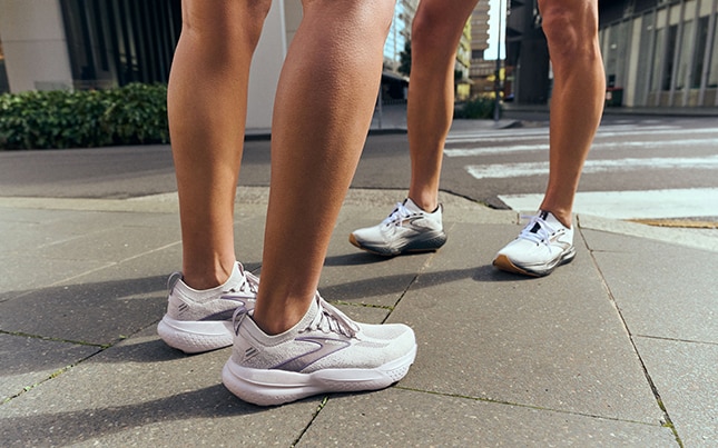 Urban walkers wearing white Ghost 15s