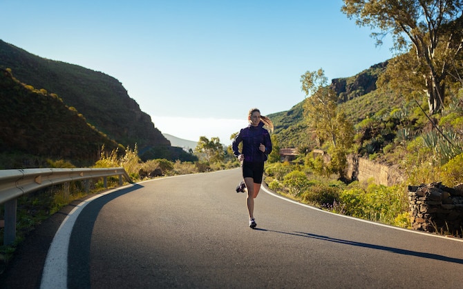 Runner on a windy road