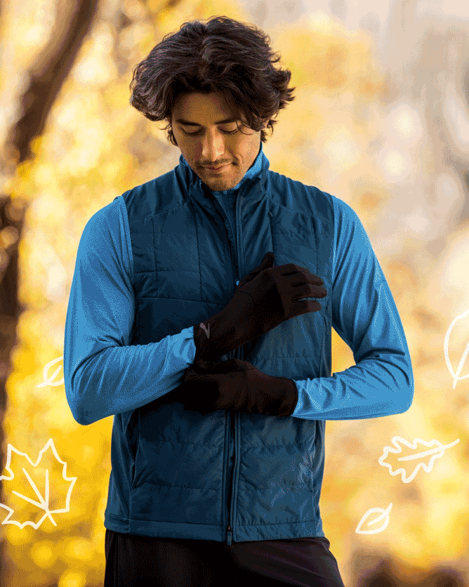 man putting on fusion midweight gloves