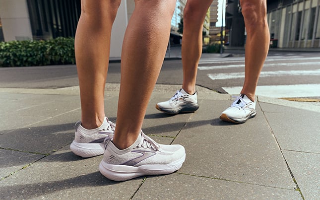 Urban walkers wearing white Ghost 15s