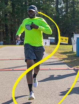 Runner crossing the finish line or a marathon