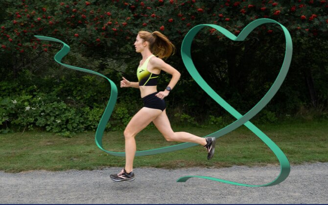 A runner outside with a green ribbon
