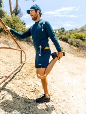 Tim Senesi stretching on a sunny path