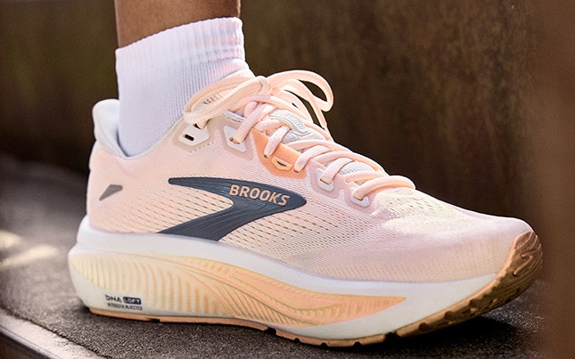 Close-up of someone’s feet wearing the Ghost 18 on the concrete stairs