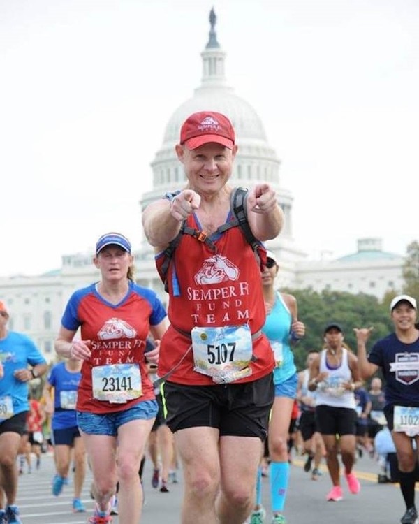 Runner in a marathon with a group