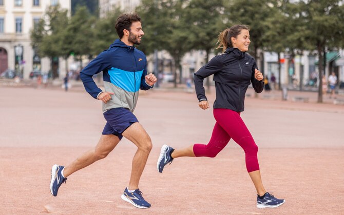 Two runners starting their run in new Brooks clothing