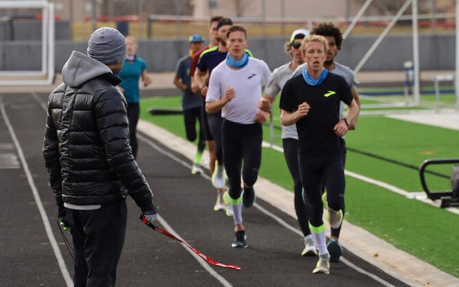 Runners training on a track