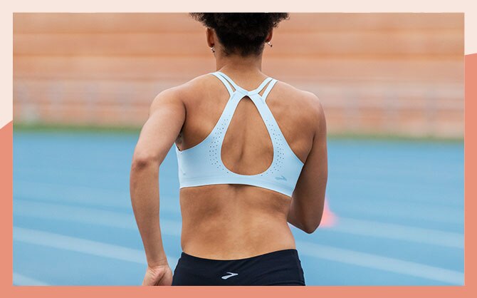 The Dare Strappy run bra, seen from the back to display its strappy, minimal back design.