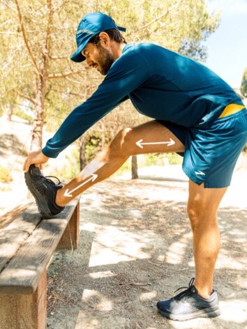 Tim Senesi stretching his leg