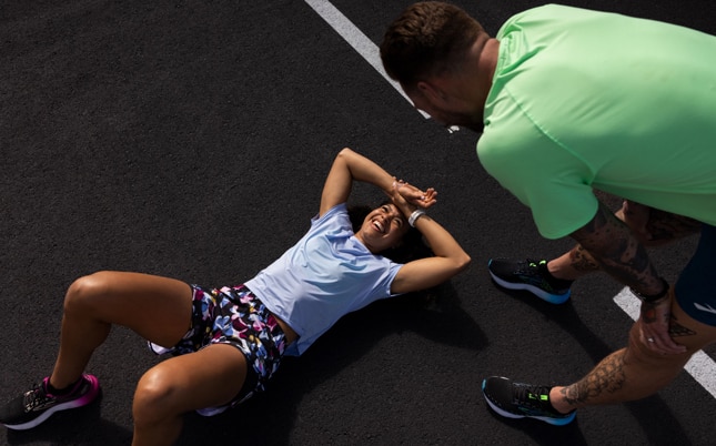 Runner taking a break on the concreet