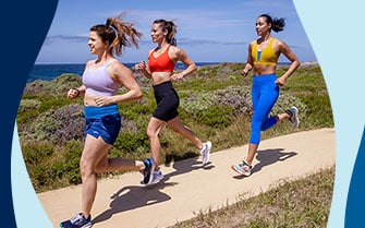 Three women on a run outside