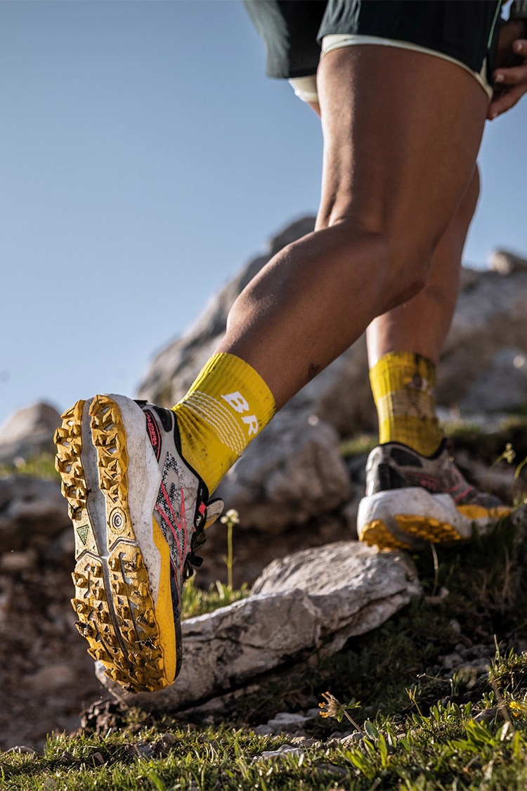 Angle shot of a woman wearing Brooks Caldera 7 running shoes