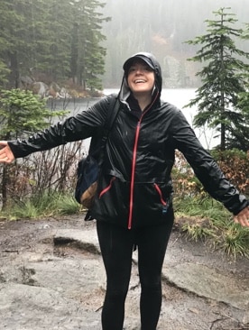 Women on a hike up to a lake