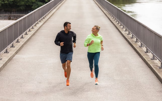 Two runners running together