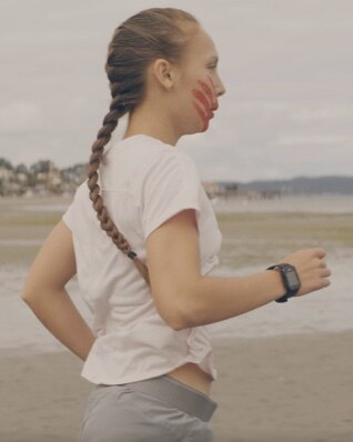 Rosalie running on the beach