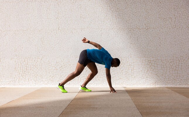 Male runner ready to sprint