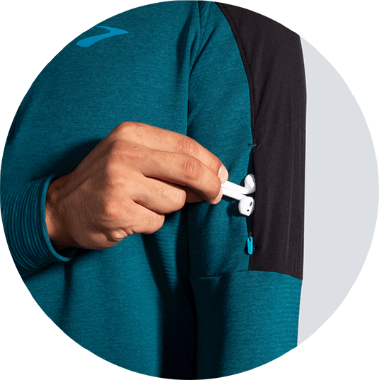Zippered arm pocket
