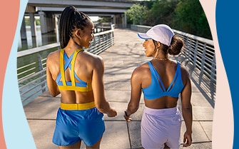 Two women walking outside