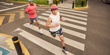 Two men running outside