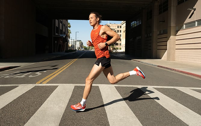 Man running on the crosswalk