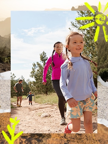 A man and a woman running on trail with two kids