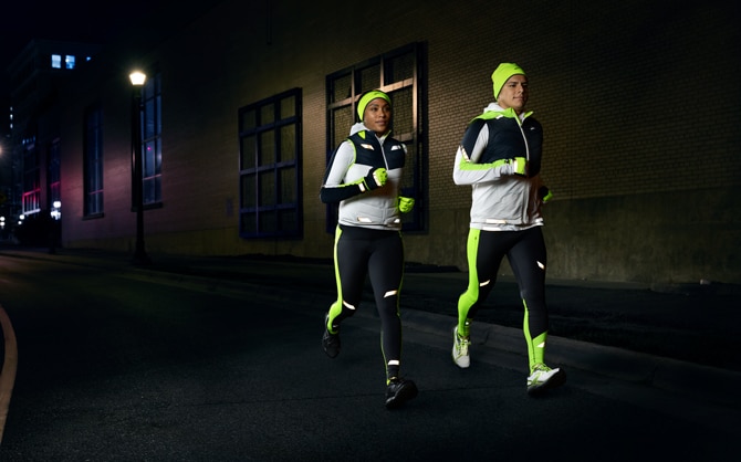Runners wearing bright clothing in the dark