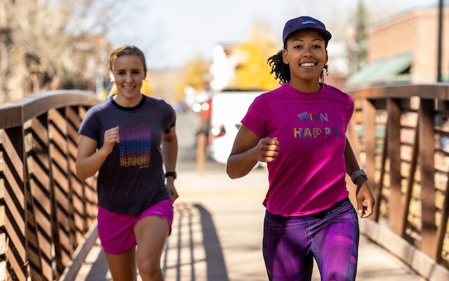 Two female runners wearing Brooks apparel