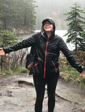 Women on a hike up to a lake