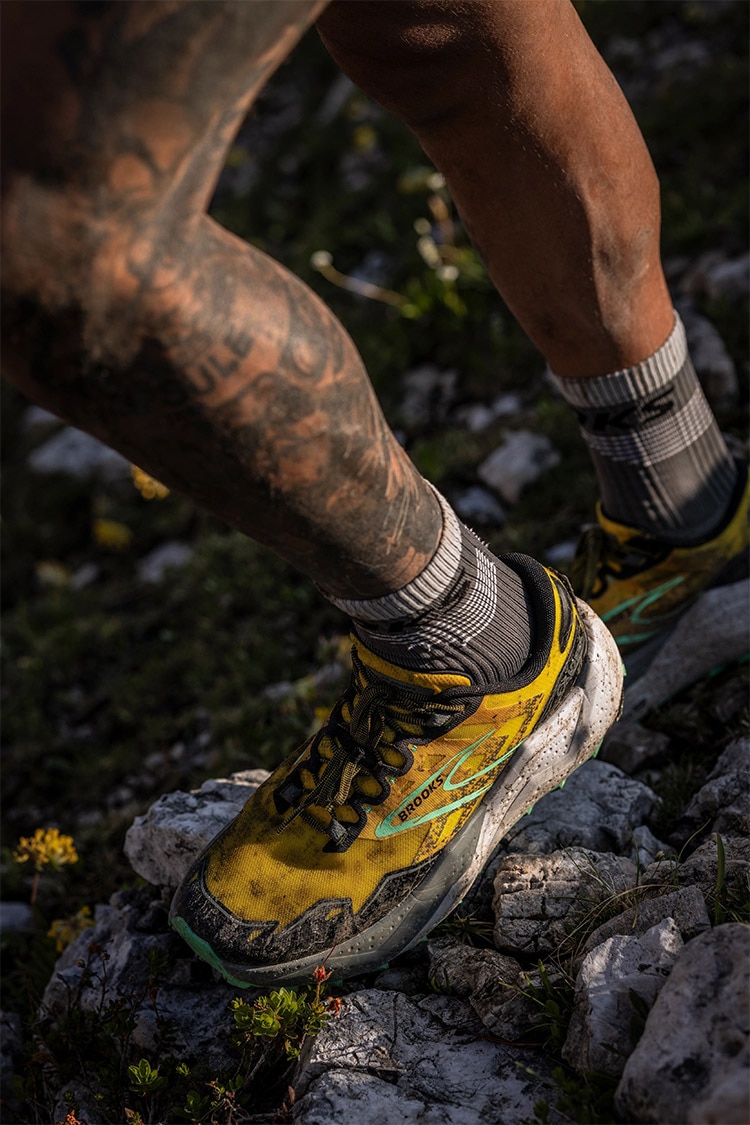 Angle shot of a man wearing Brooks Caldera 7 running shoes
