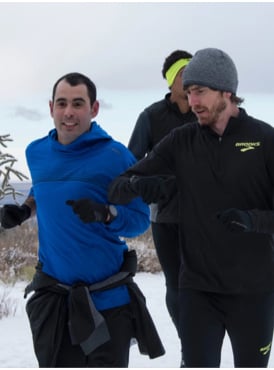 Andy smiling on a run in the snow