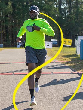 Runner crossing the finish line or a marathon