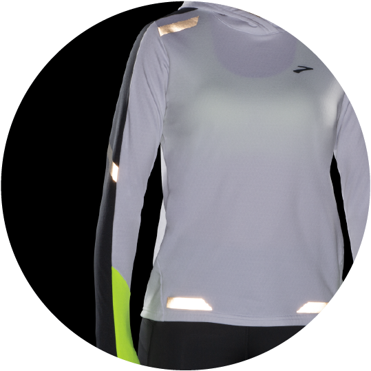 Fluorescence, high contrast, and 3M™ Scotchlite™ Carbon Black Stretch reflectivity in critical motion zones help drivers recognize you as a runner.