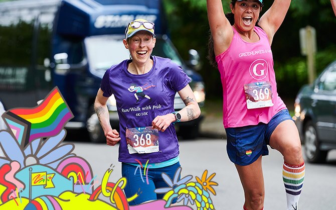 Two women jumping with joy during a race