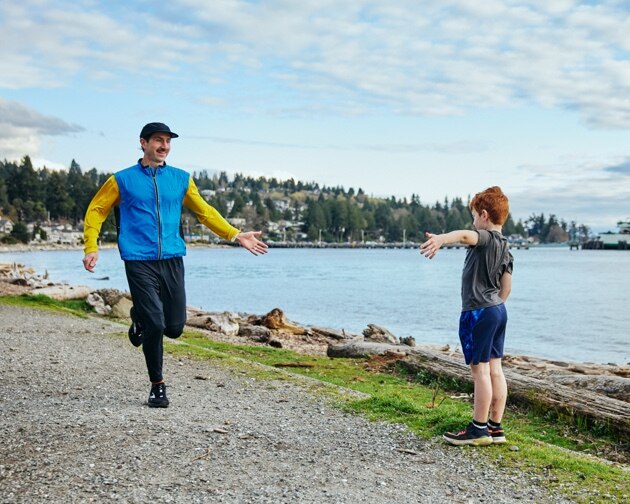 Ben running by the beach