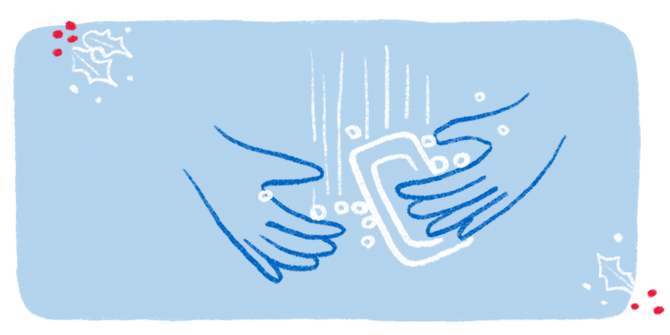 An illustration of a pair of hands lathering up with a bar of soap. 