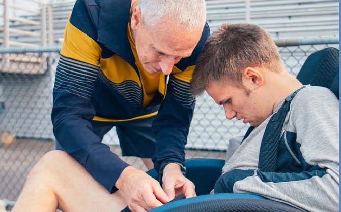 Peter preparing with Brandon for a run