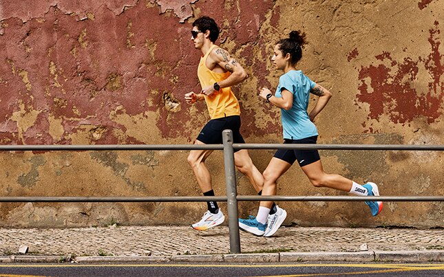 Woman looking at her watch before her run