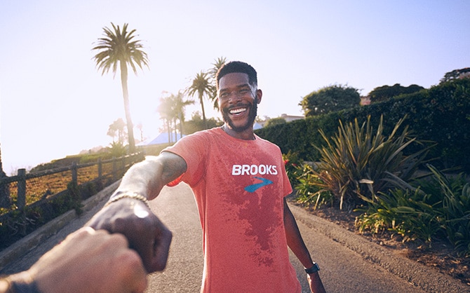 Runners fist bump