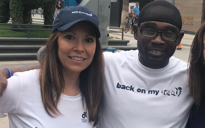 BoMF CEO Katy Sherratt and a member pose at an event.