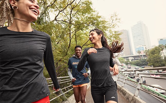 A man and a woman taking some rest on a run