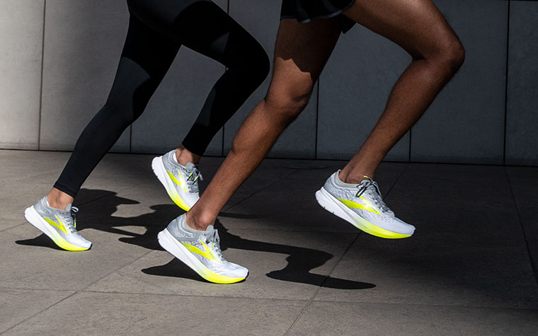 Close-up of two runners’ legs in the Hyperion Elite.